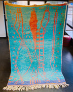 Sininen villamatto oranssi kuvio