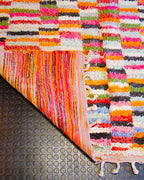 Käsinsolmittu matto