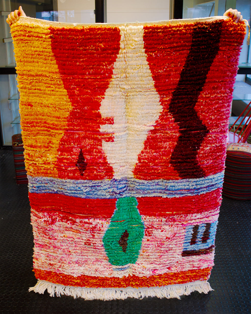 monivärinen villamatto