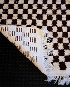 Käsinsolmittu villamatto