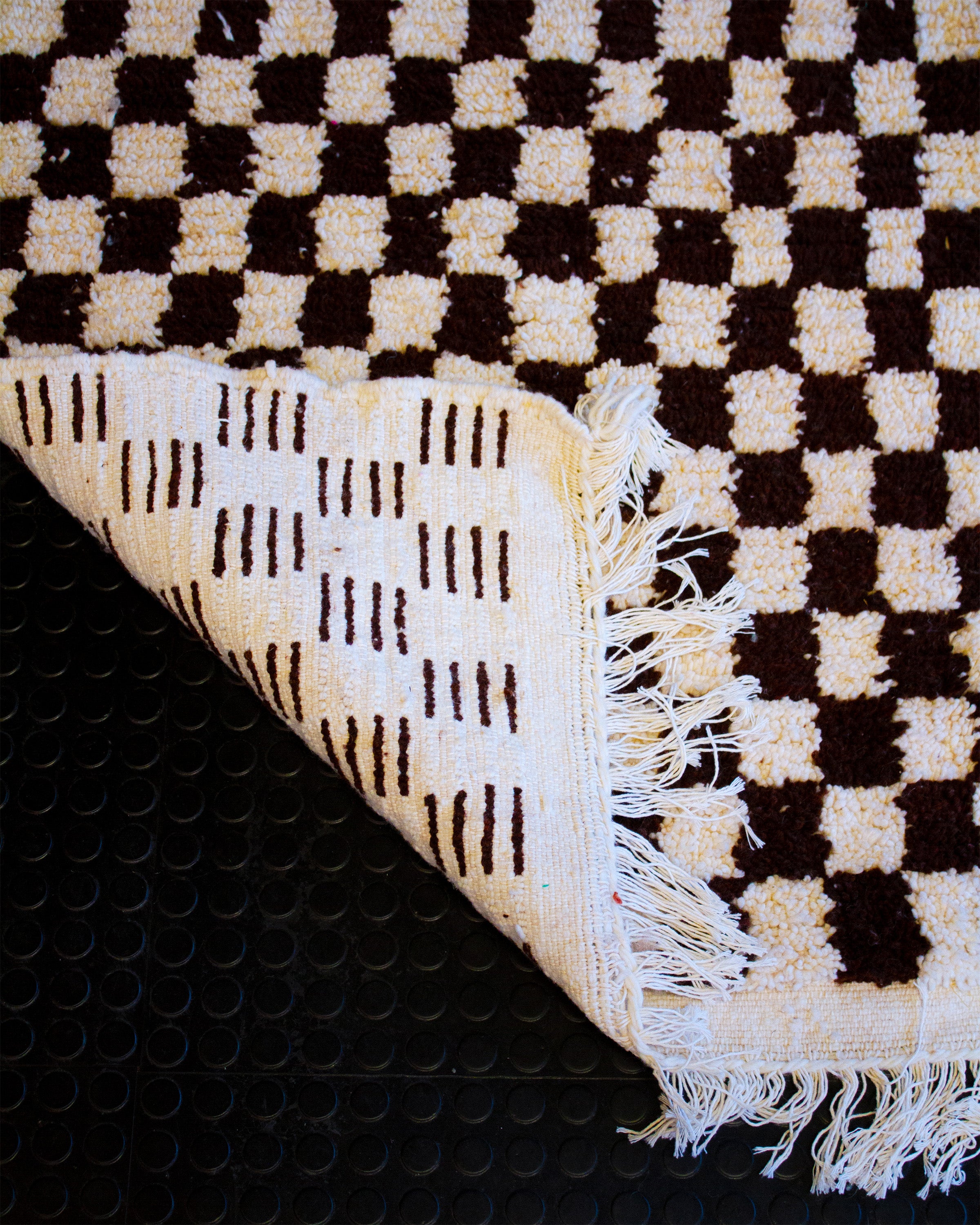 Käsinsolmittu villamatto