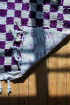 Lila ruudullinen villamatto<br>155cm x 105cm
