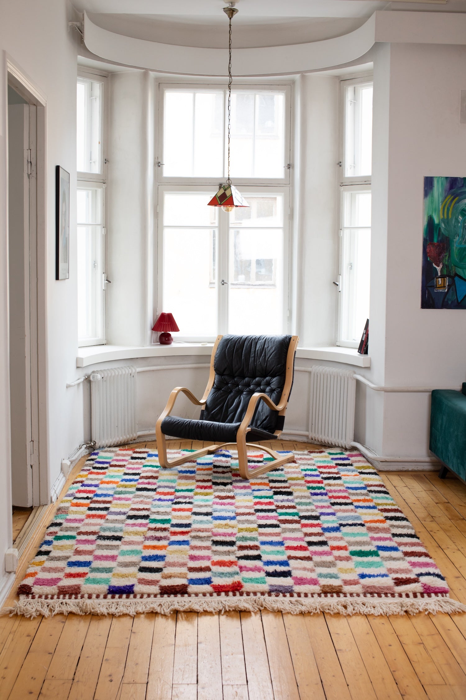 Ruudullinen värikäs villamatto